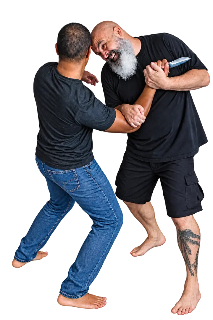 Coach Jeff and a training partner demonstrating a blade threat scenario