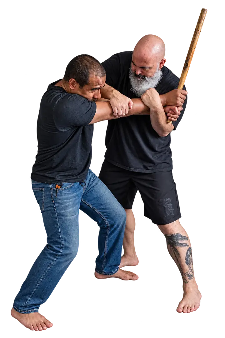Coach Jeff and a training partner demonstrating an impact-weapon threat scenario