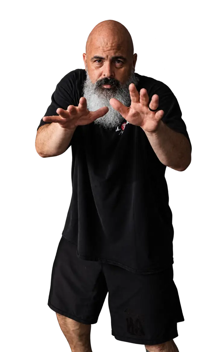 Coach Jeff demonstrating his defensive posture with hands extended